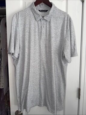 Travis Mathew striped polo